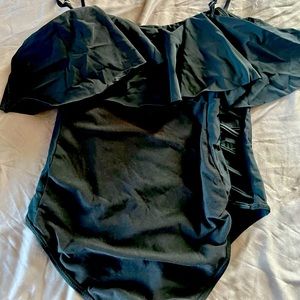 One peice sexy bathing suit with cut out sides-